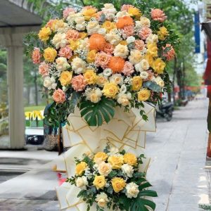 Kệ Hoa Chúc Mừng Tone Vàng Cam